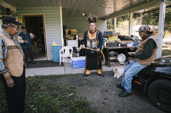 Ucwalmicw and N'quatqua with the native Demon Armon in indian N'quatqua traditional costume, Lake Andersen, British Columbia, Canada